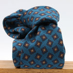 Holliday &amp; Brown for Cruciani &amp; Bella
100% Printed Wool
Self-Tipped

Torquise Blue, Blue and Orange motif Tie&nbsp;
Handmade in Italy

8 cm x 150 cm
#9595