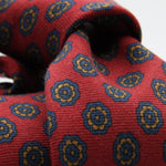 Holliday &amp; Brown for Cruciani &amp; Bella
100% Printed Wool
Self-Tipped

Red, Blue and Brown motif Tie&nbsp;
Handmade in Italy

8 cm x 150 cm
#8079