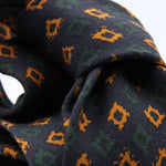 Cruciani &amp; Bella
Printed and Handmade in Italy
100% Wool
Unlined
Blue, Dark Green and Gold Yellow Motif Tie
8 cm x 150 cm
#9162