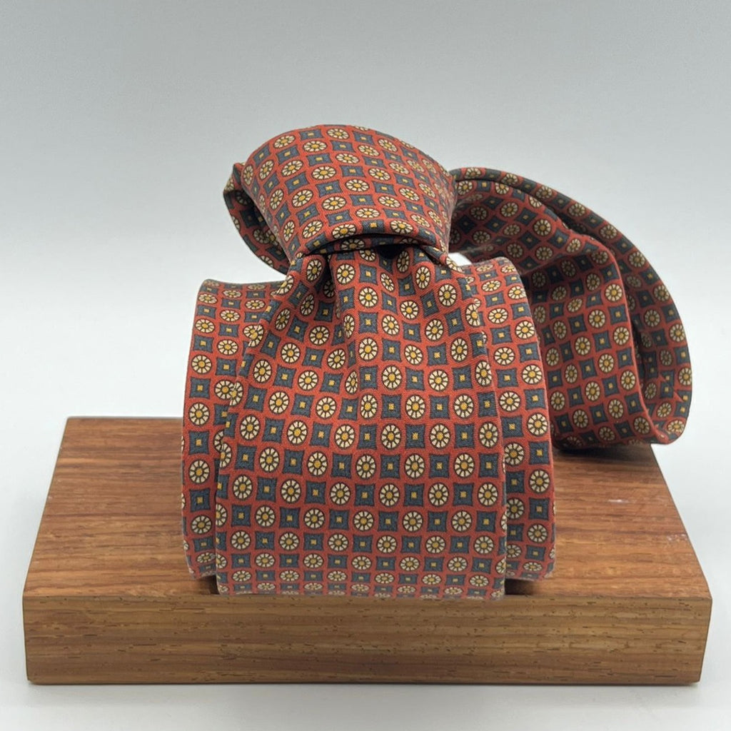 Drake's for Cruciani e Bella 100%  Printed Madder Silk Self Tipped Rust, Blue, Yellow floral motif Tie 36 oz Handmade in London, England 9 cm x 148 cm #2395