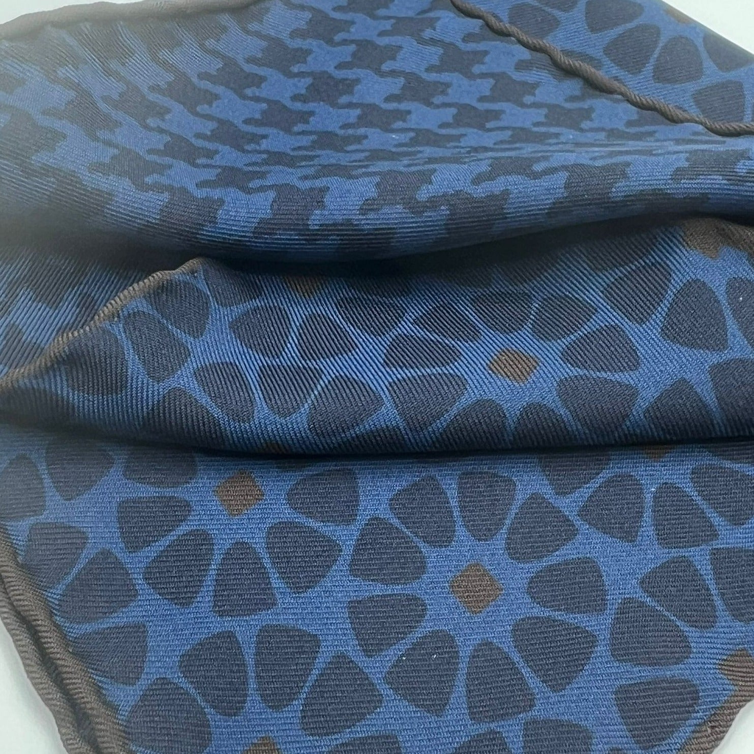 Holliday & Brown Hand-rolled   Holliday & Brown for Cruciani & Bella 100% Silk Blue, Brown Double Faces Patterned  Motif  Pocket Square Handmade in Italy 32 cm X 32 cm