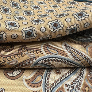 Holliday & Brown Hand-rolled   Holliday & Brown for Cruciani & Bella 100% Silk Beige, Light Brown and Blue paisley Double Faces Paisley  Motif  Pocket Square Handmade in Italy 32 cm X 32 cm