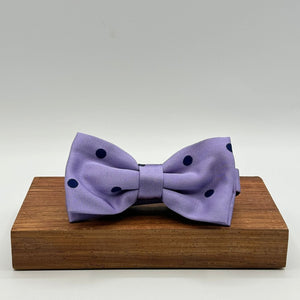 <ul> <li>Cruciani &amp; Bella Bow Tie</li> <li>100% Woven Silk Jacquard Made in England</li> <li>Handmade in Italy</li> <li>Violet, Blue Polka Dots</li> <li>Handcrafted in Italy</li> <li>Coated metal Labels</li> <li>Bow Ties</li> </ul>