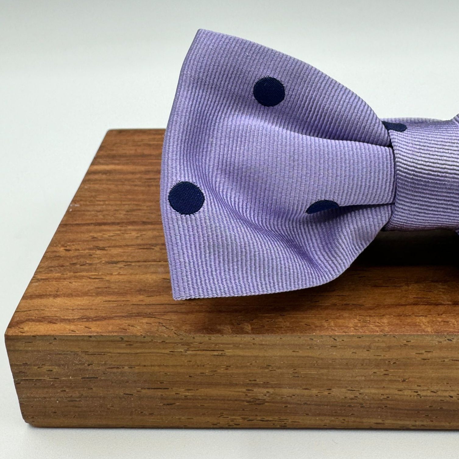 <ul> <li>Cruciani &amp; Bella Bow Tie</li> <li>100% Woven Silk Jacquard Made in England</li> <li>Handmade in Italy</li> <li>Violet, Blue Polka Dots</li> <li>Handcrafted in Italy</li> <li>Coated metal Labels</li> <li>Bow Ties</li> </ul>