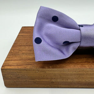 <ul> <li>Cruciani &amp; Bella Bow Tie</li> <li>100% Woven Silk Jacquard Made in England</li> <li>Handmade in Italy</li> <li>Violet, Blue Polka Dots</li> <li>Handcrafted in Italy</li> <li>Coated metal Labels</li> <li>Bow Ties</li> </ul>