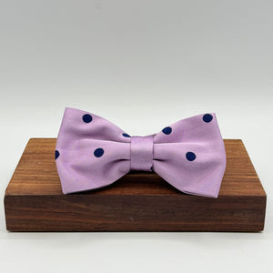 <ul> <li>Cruciani &amp; Bella Bow Tie</li> <li>100% Woven Silk Jacquard Made in England</li> <li>Handmade in Italy</li> <li>Lilac, Blue Polka Dots</li> <li>Handcrafted in Italy</li> <li>Coated metal Labels</li> <li>Bow Ties</li> </ul>