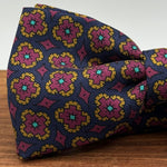 <ul> <li>Cruciani &amp; Bella Bow Tie</li> <li>100% Printed Silk Made in England</li> <li>Handmade in Italy</li> <li>Blue,Red, Orange and Light Blue motif</li> <li>Handcrafted in Italy</li> <li>Coated metal Labels</li> <li>Bow Ties</li> </ul>