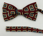 <ul> <li>Cruciani &amp; Bella Bow Tie</li> <li>100% Printed Madder Silk&nbsp;</li> <li>Handmade in Italy</li> <li>Red Wine, Light Blue, Brown and Cream motif</li> <li>Handcrafted in Italy</li> <li>Coated metal Labels</li> <li>Bow Ties</li> </ul>