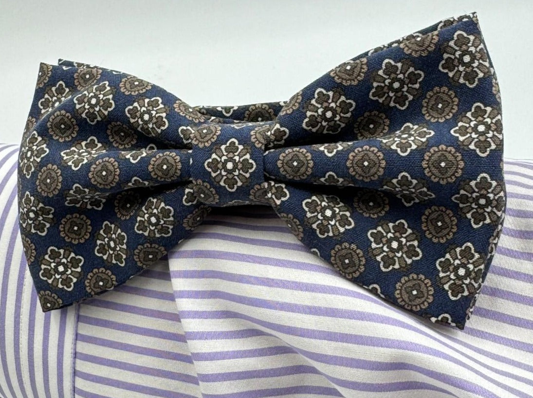 <ul> <li>Cruciani &amp; Bella Bow Tie</li> <li>100% Printed Madder Silk&nbsp;</li> <li>Handmade in Italy</li> <li>Blue, Beige, Brown and Light Brown motif</li> <li>Handcrafted in Italy</li> <li>Coated metal Labels</li> <li>Bow Tie</li> </ul>