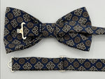 <ul> <li>Cruciani &amp; Bella Bow Tie</li> <li>100% Printed Madder Silk&nbsp;</li> <li>Handmade in Italy</li> <li>Blue, Beige, Brown and Light Brown motif</li> <li>Handcrafted in Italy</li> <li>Coated metal Labels</li> <li>Bow Tie</li> </ul>