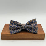 <ul> <li>Cruciani &amp; Bella Bow Tie</li> <li>100% Printed Madder Silk&nbsp;</li> <li>Handmade in Italy</li> <li>Blue,&nbsp; Brown, Light Blue and Pink motif</li> <li>Handcrafted in Italy</li> <li>Coated metal Labels</li> <li>Bow Tie</li> </ul>