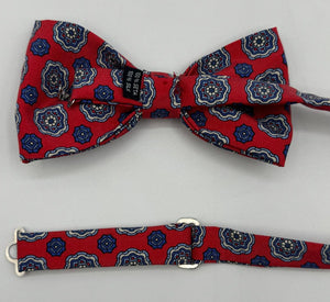 <ul> <li>Cruciani &amp; Bella Bow Tie</li> <li>100% Printed Madder Silk&nbsp;</li> <li>Handmade in Italy</li> <li>Red, Light Blue and Off White motif&nbsp;&nbsp;</li> <li>Handcrafted in Italy</li> <li>Coated metal Labels</li> <li>Bow Tie</li> </ul>