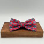 <ul> <li>Cruciani &amp; Bella Bow Tie</li> <li>100% Printed Madder Silk&nbsp;</li> <li>Handmade in Italy</li> <li>Red, Light Blue and Off White motif&nbsp;&nbsp;</li> <li>Handcrafted in Italy</li> <li>Coated metal Labels</li> <li>Bow Tie</li> </ul>