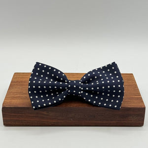 <ul> <li>Cruciani &amp; Bella Bow Tie</li> <li>100% Printed Silk&nbsp;</li> <li>Handmade in Italy</li> <li>Blue and White Polka Dots</li> <li>Handcrafted in Italy</li> <li>Coated metal Labels</li> <li>Bow Tie</li> </ul>