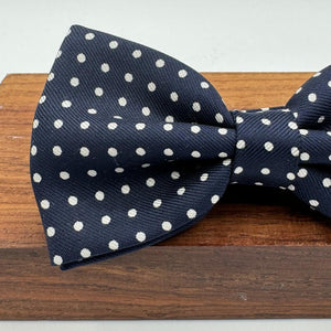 <ul> <li>Cruciani &amp; Bella Bow Tie</li> <li>100% Printed Silk&nbsp;</li> <li>Handmade in Italy</li> <li>Blue and White Polka Dots</li> <li>Handcrafted in Italy</li> <li>Coated metal Labels</li> <li>Bow Tie</li> </ul>