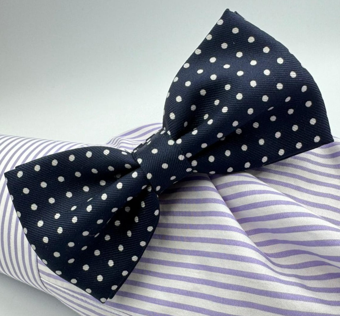 <ul> <li>Cruciani &amp; Bella Bow Tie</li> <li>100% Printed Silk&nbsp;</li> <li>Handmade in Italy</li> <li>Blue and White Polka Dots</li> <li>Handcrafted in Italy</li> <li>Coated metal Labels</li> <li>Bow Tie</li> </ul>