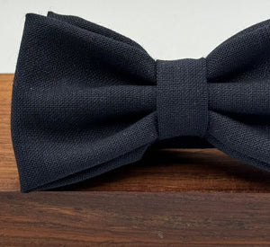 <ul> <li>Cruciani &amp; Bella Bow Tie</li> <li>100% Wool Hardy Minnis</li> <li>Handmade in Italy</li> <li>Dark Blue Plain</li> <li>Handcrafted in Italy</li> <li>Coated metal Labels</li> <li>Bow Ties</li> </ul>