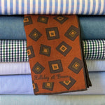 Holliday &amp; Brown
Hand-rolled&nbsp;&nbsp;
Holliday &amp; Brown for Cruciani &amp; Bella
100% Silk
Rust, Brown, Light Brown and Light Green
Double Faces
Motif&nbsp; Pocket Square
Handmade in Italy

32 cm X 32 cm