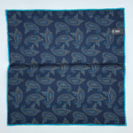 Cruciani &amp; Bella
Hand-rolled&nbsp;&nbsp;

100% Wool
Blue, Brick, Turquoise
Double Faces
Basset Hound and Paisley Motif&nbsp; Pocket Square
Handmade in Italy

33 cm X 33 cm
