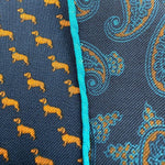 Cruciani &amp; Bella
Hand-rolled&nbsp;&nbsp;

100% Wool
Blue, Brick, Turquoise
Double Faces
Basset Hound and Paisley Motif&nbsp; Pocket Square
Handmade in Italy

33 cm X 33 cm