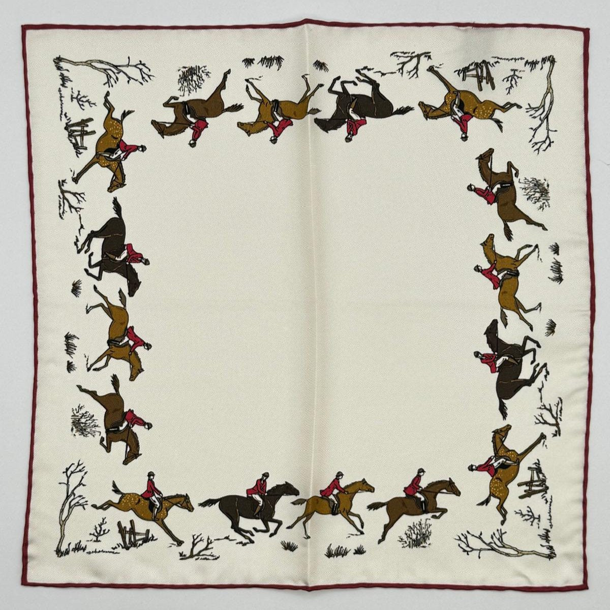 Cruciani &amp; Bella
Hand-rolled&nbsp;&nbsp;
100% Silk
Off White, Red, Brown and Light Brown

Horses Motifs Pocket Square
Made in Italy
33 cm X 33 cm