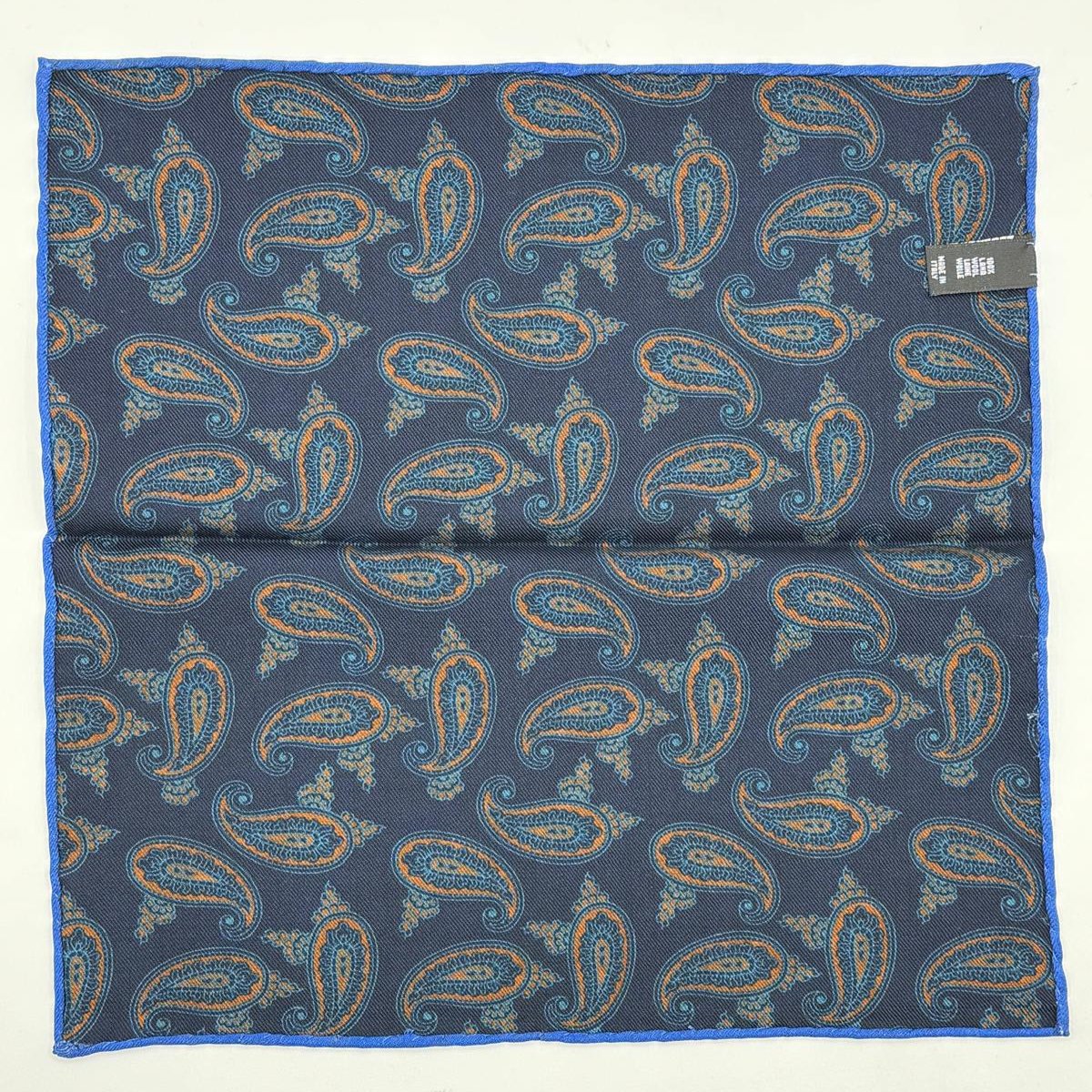 Cruciani &amp; Bella
Hand-rolled&nbsp;&nbsp;

100% Wool
Brown, Brick, Olimpic Blue
Double Faces
Basset Hound and Paisley Motif&nbsp; Pocket Square
Handmade in Italy

33 cm X 33 cm