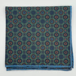 Cruciani &amp; Bella
Hand-rolled&nbsp;&nbsp;
100% Madder Silk
Green, Blue, Rust and Light Blue
Motif Pocket Square
Double Faces
Made in Italy
33 cm X 33 cm