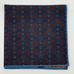 Cruciani &amp; Bella
Hand-rolled&nbsp;&nbsp;
100% Madder Silk
Denim Blue, Orange, Brown and Light Blue
Motif Pocket Square
Double Faces
Made in Italy
33 cm X 33 cm