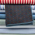 Cruciani &amp; Bella
Hand-rolled&nbsp;&nbsp;
100% Madder Silk
Denim Blue, Orange, Brown and Light Blue
Motif Pocket Square
Double Faces
Made in Italy
33 cm X 33 cm