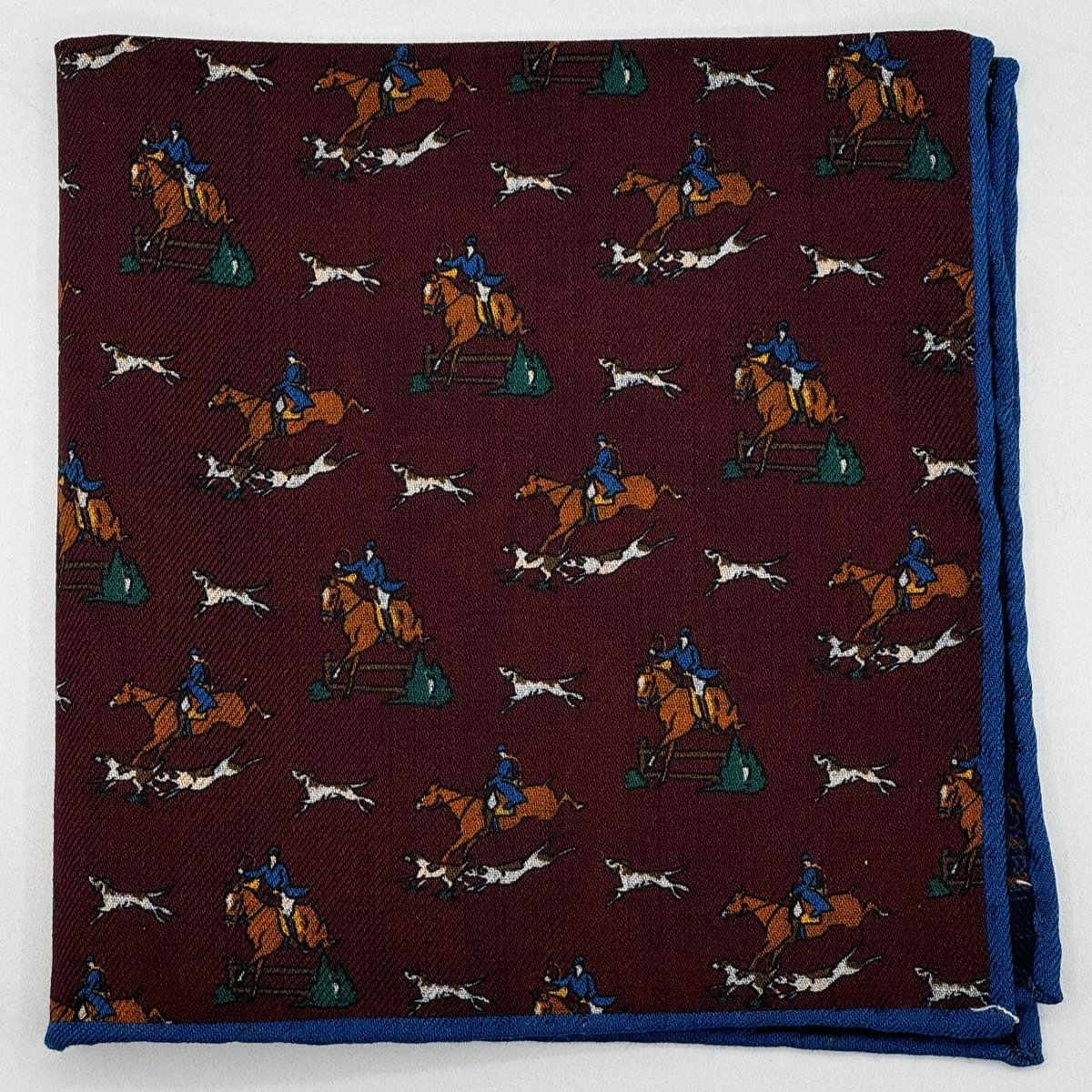 Cruciani &amp; Bella
Hand-rolled&nbsp;&nbsp;

100% Wool
Red Wine, Brown, Blue, Green and White
Double Faces
Horses and Paisley Motif&nbsp; Pocket Square
Handmade in Italy

33 cm X 33 cm