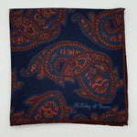 Holliday &amp; Brown for Cruciani &amp; Bella
Hand-rolled&nbsp;&nbsp;

100% Silk
Blue, Rust, Brown, Olimpic Blue,&nbsp;
Double Faces
Motif&nbsp; Pocket Square
Handmade in Italy

32 cm X 32 cm