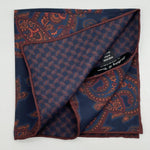 Holliday &amp; Brown for Cruciani &amp; Bella
Hand-rolled&nbsp;&nbsp;

100% Silk
Blue, Rust, Brown, Olimpic Blue,&nbsp;
Double Faces
Motif&nbsp; Pocket Square
Handmade in Italy

32 cm X 32 cm