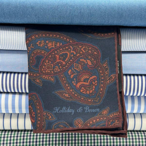 Holliday &amp; Brown for Cruciani &amp; Bella
Hand-rolled&nbsp;&nbsp;

100% Silk
Blue, Rust, Brown, Olimpic Blue,&nbsp;
Double Faces
Motif&nbsp; Pocket Square
Handmade in Italy

32 cm X 32 cm