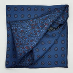 Holliday &amp; Brown for Cruciani &amp; Bella
Hand-rolled&nbsp;&nbsp;

100% Silk
Light Blue, Blue and Red
Double Faces
Motif&nbsp; Pocket Square
Handmade in Italy

32 cm X 32 cm