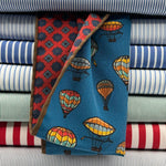 ruciani &amp; Bella
Hand-rolled&nbsp;&nbsp;
100% Madder Silk&nbsp;
Light Blue, Orange, Red, Blue and Yellow
Motif Pocket Square
Double Faces
Made in Italy
33 cm X 33 cm