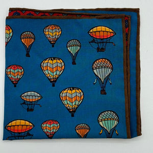 ruciani &amp; Bella
Hand-rolled&nbsp;&nbsp;
100% Madder Silk&nbsp;
Light Blue, Orange, Red, Blue and Yellow
Motif Pocket Square
Double Faces
Made in Italy
33 cm X 33 cm
