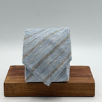 Cruciani &amp; Bella
80% Wool 20% Cashmere
Unlined
Light Blue and Light Brown Tie

Handmade in Italy
9 cm x 148 cm
New Old Stock