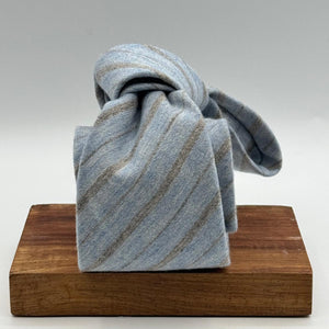 Cruciani &amp; Bella
80% Wool 20% Cashmere
Unlined
Light Blue and Light Brown Tie

Handmade in Italy
9 cm x 148 cm
New Old Stock
