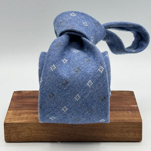 Cruciani &amp; Bella Old Label
80% Wool 20% Cashmere
Unlined
Light Blue, White and Light Grey motif Tie

Handmade in Italy
9 cm x 148 cm
New Old Stock