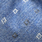 Cruciani &amp; Bella Old Label
80% Wool 20% Cashmere
Unlined
Light Blue, White and Light Grey motif Tie

Handmade in Italy
9 cm x 148 cm
New Old Stock