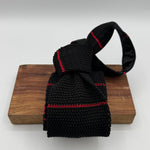Cruciani &amp; Bella
100% Silk
Knitted Tie

Black, Red Stripe
Handmade in Italy
7,5 cm x 147 cm
New Old Stock