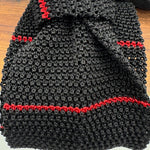 Cruciani &amp; Bella
100% Silk
Knitted Tie

Black, Red Stripe
Handmade in Italy
7,5 cm x 147 cm
New Old Stock