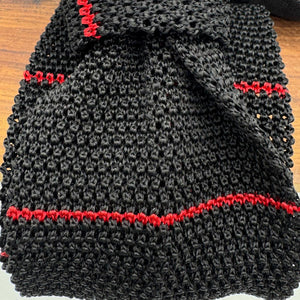 Cruciani &amp; Bella
100% Silk
Knitted Tie

Black, Red Stripe
Handmade in Italy
7,5 cm x 147 cm
New Old Stock