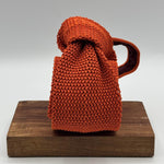 Cruciani &amp; Bella
100% Silk
Knitted Pointed Tie

Orange Plain
Handmade in Italy
8 cm x 147 cm
New Old Stock