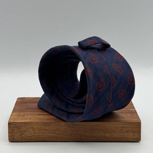 Cruciani &amp; Bella
100% Silk&nbsp;
Tipped
Blue, Red Wine paisley Motif Tie
Handmade in Italy
8 cm x 148 cm
New Old Stock