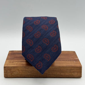 Cruciani &amp; Bella
100% Silk&nbsp;
Tipped
Blue, Red Wine paisley Motif Tie
Handmade in Italy
8 cm x 148 cm
New Old Stock