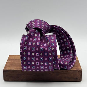 Cruciani &amp; Bella
100% Printed Silk&nbsp;
Tipped
Purple, Pink, Light Blue, White and Yellow Motif Tie
Handmade in Italy
8,5 cm x 148 cm
New Old Stock