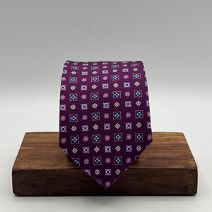 Cruciani &amp; Bella
100% Printed Silk&nbsp;
Tipped
Purple, Pink, Light Blue, White and Yellow Motif Tie
Handmade in Italy
8,5 cm x 148 cm
New Old Stock