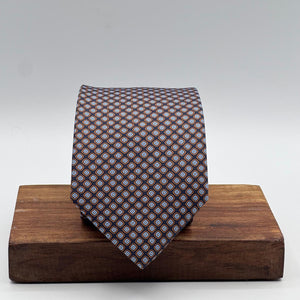Cruciani &amp; Bella
100% Printed Silk&nbsp;
Tipped
Dark Blue, Brown, Light Blue and White Motif Tie
Handmade in Italy
8,5 cm x 148 cm
New Old Stock