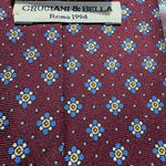 Cruciani &amp; Bella
100% Printed Silk&nbsp;
Tipped
Red Wine, Light Blue, Blue, Yellow and White Motif Tie
Handmade in Italy
8,5 cm x 148 cm
New Old Stock